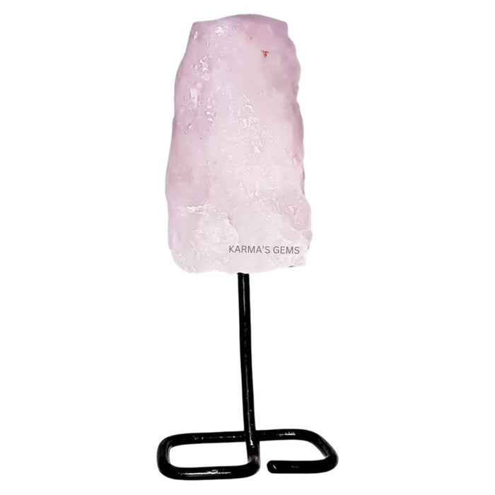 RAW ROSE QUARTZ STONE ON STAND